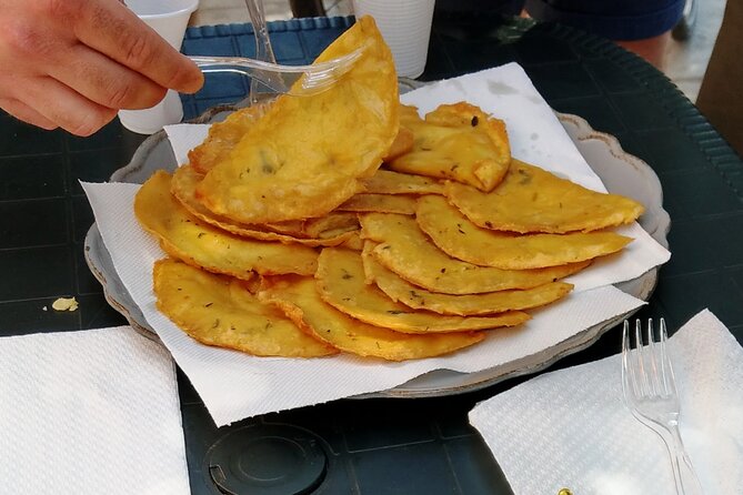3-hours Street Food Bike Tour in Palermo - Stops 3: Mercato di Ballarò and the market-meets-tasting moment