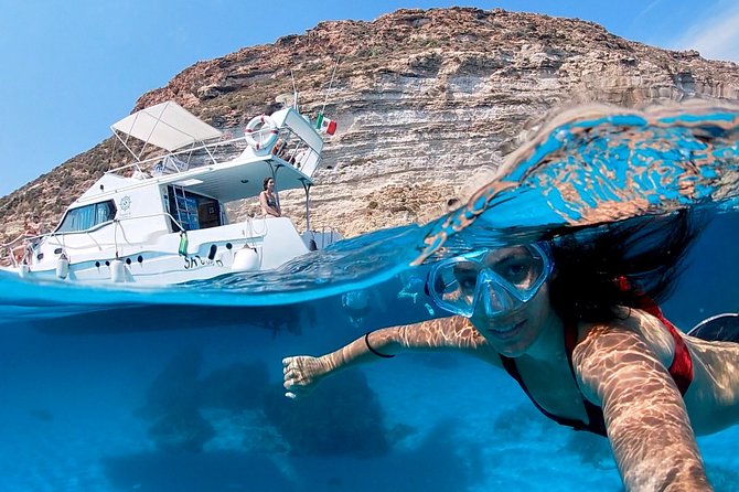 7 hours Boat trip to Lampedusa lunch, SUP and Snorkeling - Key highlights at a glance