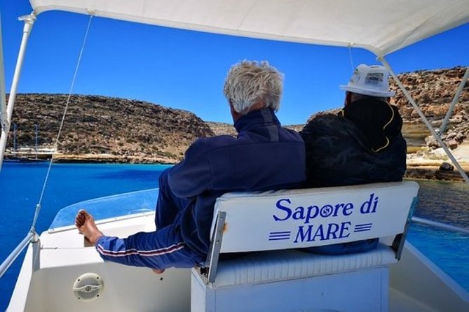 7 hours Boat trip to Lampedusa lunch, SUP and Snorkeling - La Tabaccara: crystal-clear inlet and the 50-minute window