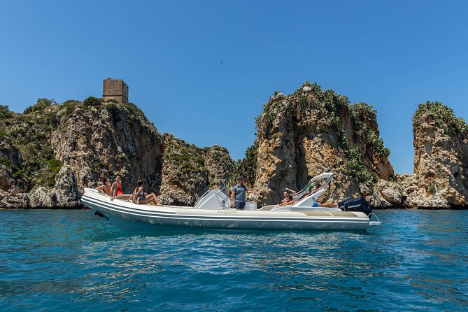 8-Hour Boat Tour from Castellammare del Golfo to San Vito Lo Capo - Cala Rossa: turquoise water and fish-filled calm