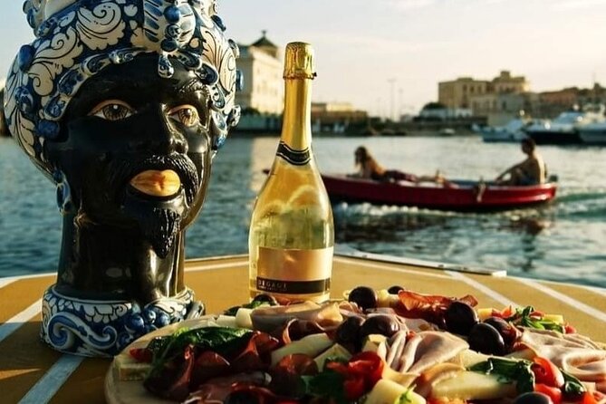 Boat Excursion to Ortigia with Typical Homemade Lunch - Sea caves and coral flowers: what you’ll actually see
