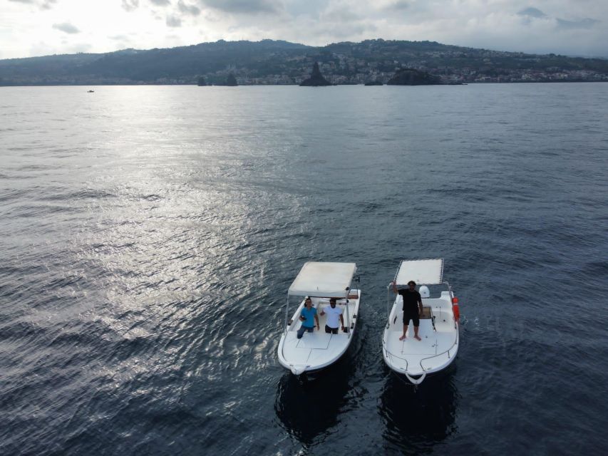 boat tour exploring and searching for dolphins in Acitrezza - Stop one: Lachea Island (and why it’s more than a quick photo break)