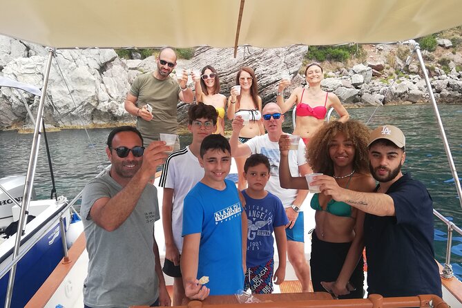 Boat tour Giardini Naxos Taormina Isola Bella Blue Grotto - Taormina from sea level: cliffs, coves, and the Ancient Theater vibe