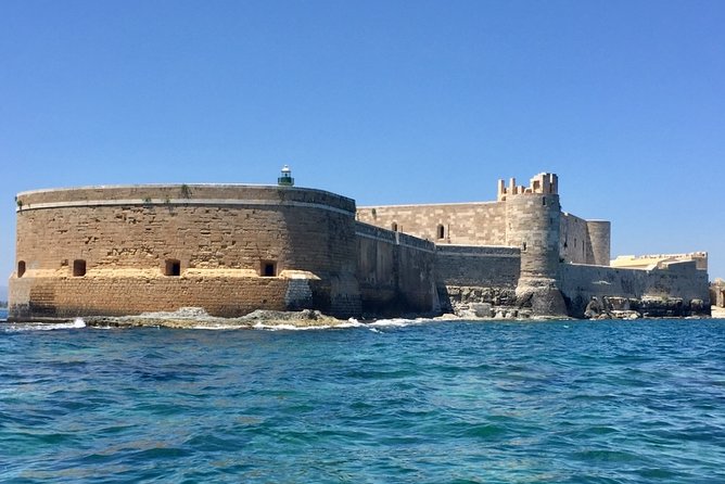 Boat tour Ortigia, sea caves and Pillirina 2h - Ognina Rocky Coasts: The Final Stretch With Big Texture