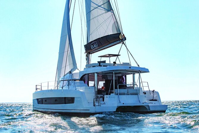 Catamaran trip and overnight stay in Palermo with meals for 8 people - Day 1 Stops: Mondello’s famous sand and Capo Gallo’s cave coast