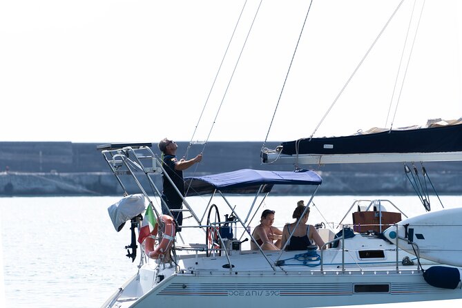 Catania boat tour along the coast with aperitif and snorkeling - Aperitif on board: prosecco, Sicilian snacks, and Limoncello