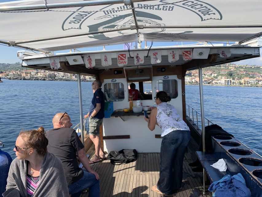 Catania: Cyclops Islands & Timpa Nature Reserve Boat Tour - Why snorkel here: volcanic rock meets real marine life