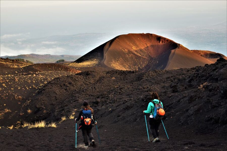 Catania: Etna Morning or Sunset Trek with Lava Tunnel & Gear - The main hike on Etna: craters, lava deserts, and a comfortable pace