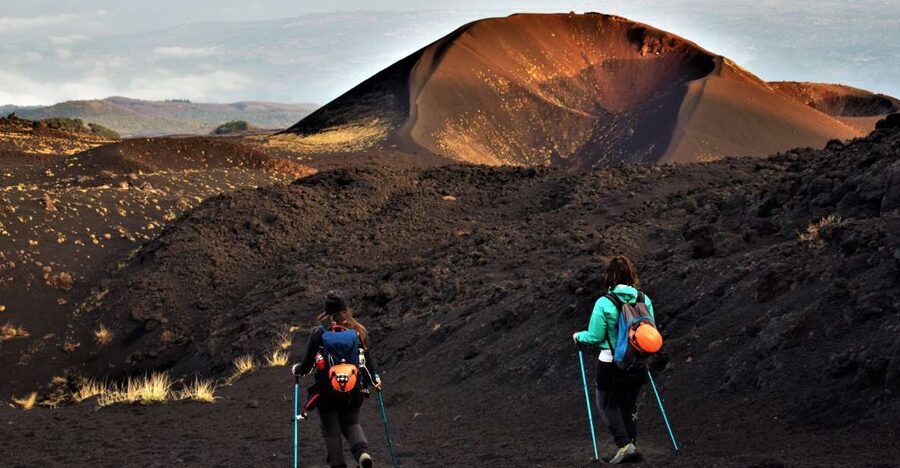 Catania: Etna Morning or Sunset Trek with Lava Tunnel & Gear - Getting to Etna from Catania: Via Alcalà meeting point and the van ride