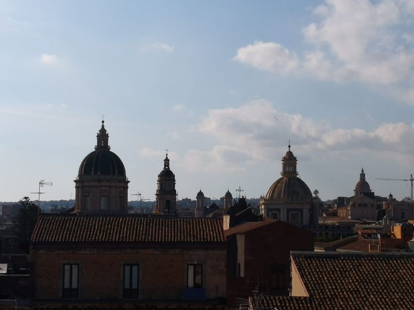 Catania: Heart of the City Guided Walking Tour - Fish market stop: where local life smells, sounds, and leads you to food ideas