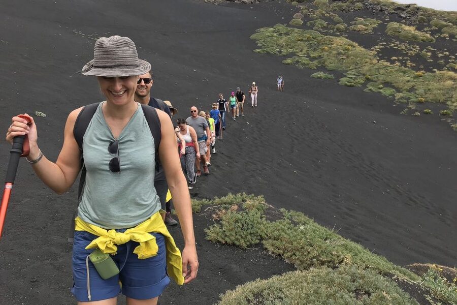 Catania: Mount Etna Adventurous Hiking Tour with Equipment - The descent surprise: Grotta Pitagora and volcanic sand channels