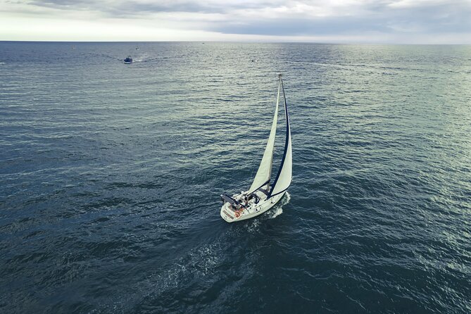Catania: Sail Cyclops Coast by Boat and Enjoy a Sicilian Aperitif - From porto di Catania: how the timing sets your expectations