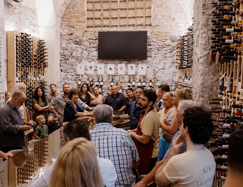 Catania: Volcanic Wine Tasting in a Metropolitan Market - Four glasses with matching bites: the pairing is the lesson