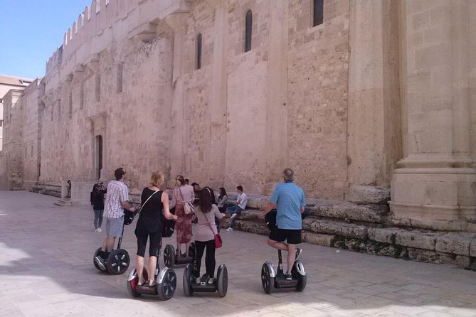 CSTRents - Syracuse Segway PT Authorized Tour - Crossing Umberto Bridge: Our Lady of Tears and mainland Syracuse