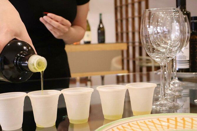 Discovering artisanal sicilian products and Evo oil - Giardini Naxos seafront setting: where the tasting actually feels like a break