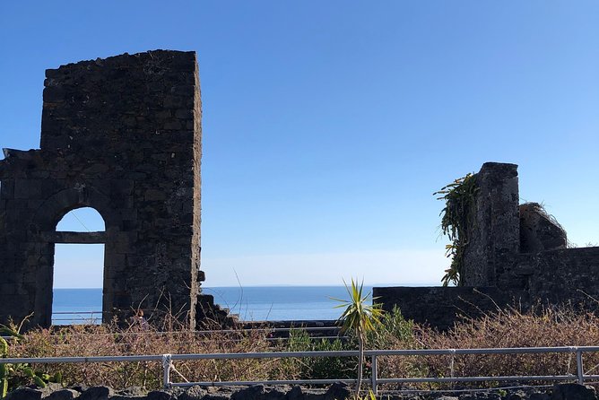 Etna, Acicastello and Acitrezza - Step into the lava flow cave: helmets and torches included