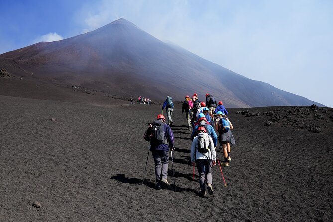 Etna: Cable Car & Hiking Tour to Summit - The uphill hike: craters, Valle del Bove, and the guide’s safety bubble