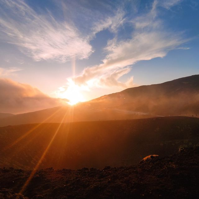 Etna excursions at sunset ancient craters and lava flows - Waiting for sunset at the end of the trail