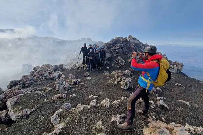 Etna North: Guided trekking to Summit volcano craters - The descent: fine ash, panoramic coast views, and guided pacing