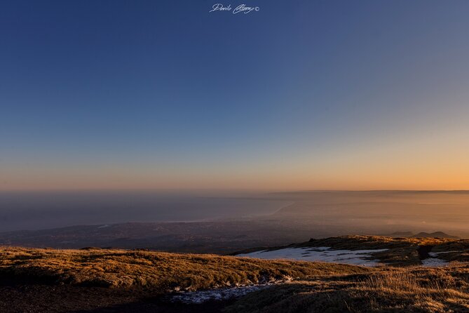 Etna Sunset Experience with aperitif - The volcanic cave walk: helmets, torches, and a different kind of Etna