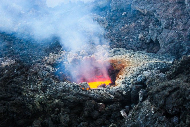 Etna & Taormina from Catania - The cave visit: helmets, torches, and winter cave limits
