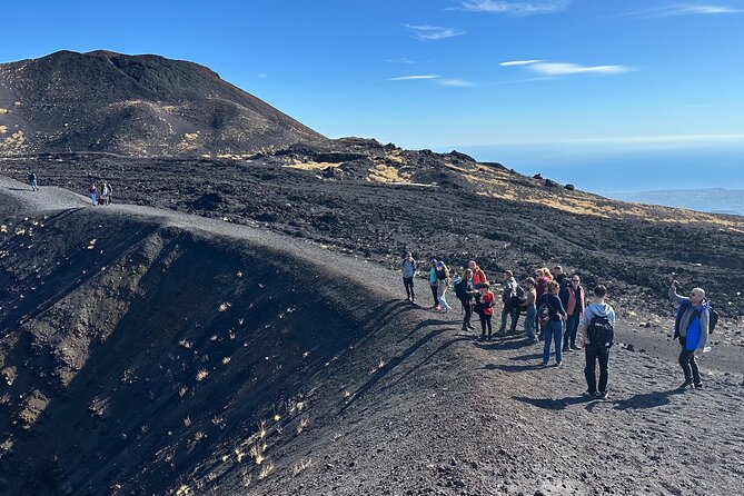 Etna trekking tour - Descending the North Slope: Volcanic Sand, Ash Canyons, and the Observatory Area
