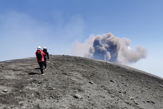 Excursion on the summit craters of Etna, with cable car and 4x4 bus - What to wear: helmets, windbreakers, and the reality of wet gear