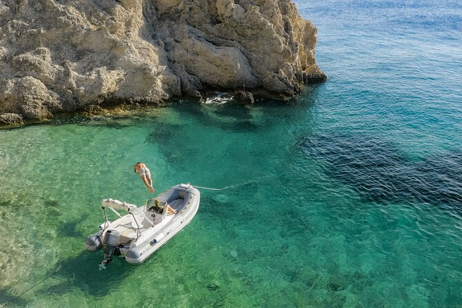 Favignana inflatable boat tour, wine tasting, snorkeling and relaxation - Cala Azzurra: blue-water swimming and a chance to play with mud