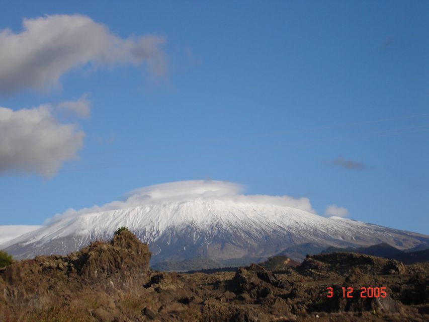 From Catania: Mount Etna Half-Day Tour and Wine Experience - What Makes the Lava Cave Visit Special (Helmets and Torches Included)