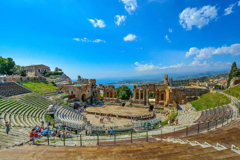 From Catania: Taormina, Isola bella & Castelmola tour - Taormina walking time: theatre views, the fortress Duomo, and classic piazzas