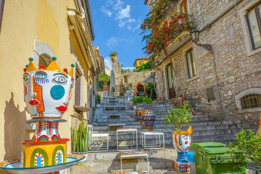 From Catania: Taormina, Isola bella & Castelmola tour - What to bring for a coastal, rain-or-shine day