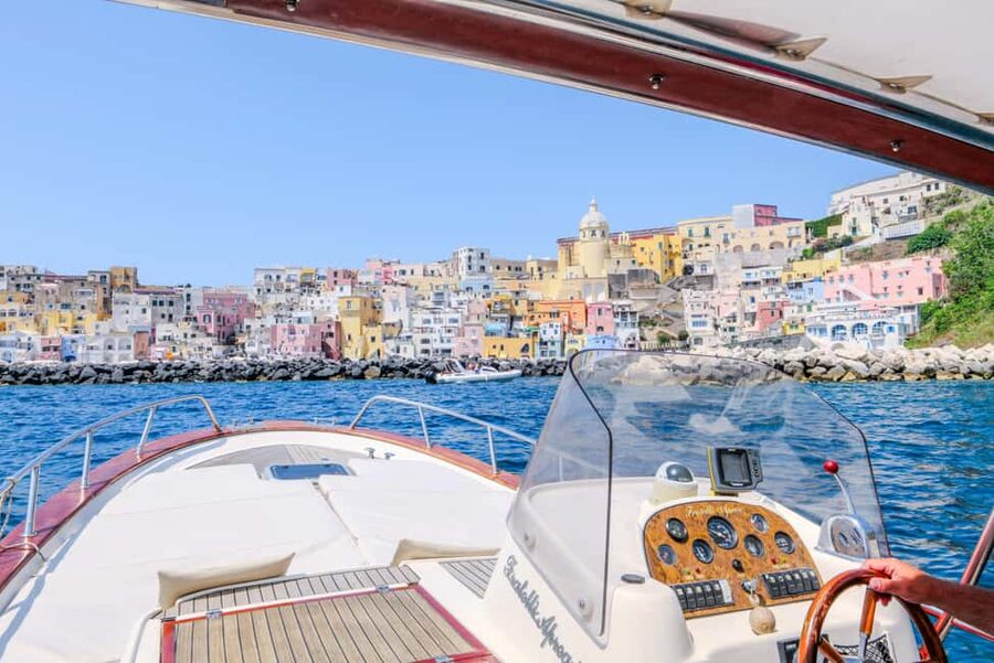 From Naples: Procida Transfer with Island Boat Tour - The gozzo boat: the best way to see Procida’s volcanic coastline