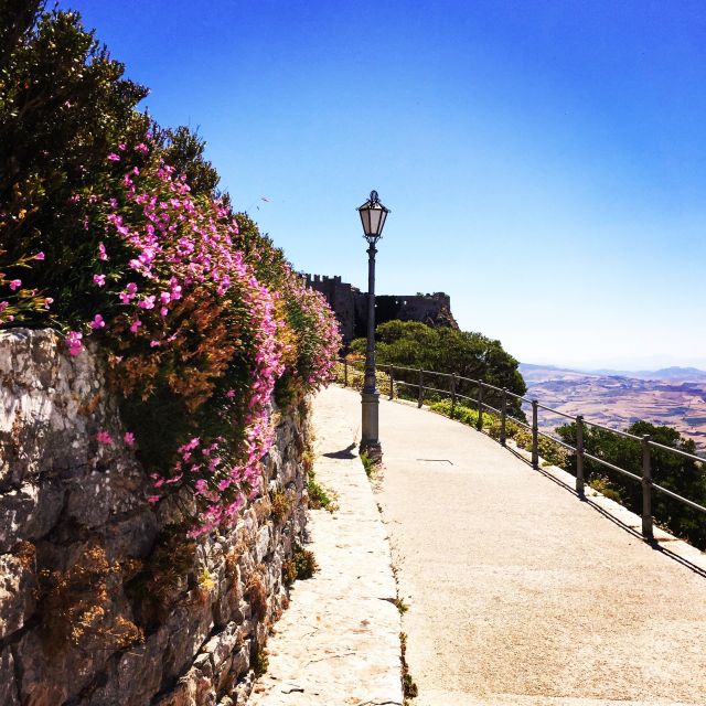 From Trapani: Erice Walking Tour and Local Products Tasting - Mandola and wine: the sweet stop with local logic