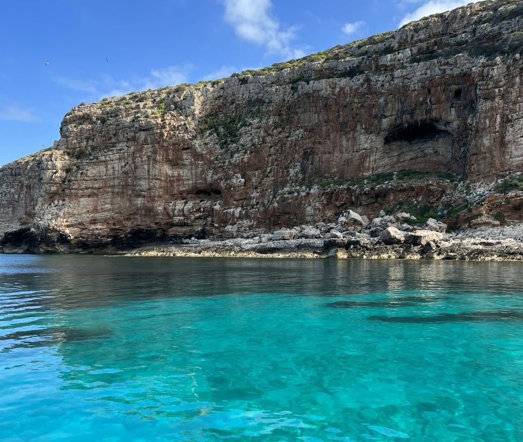 From Trapani: Favignana and Levanzo Full Day Cruise - Drinks, floating mat breaks, and the small comforts