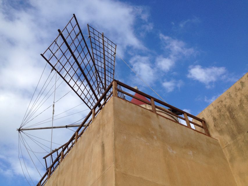 From Trapani: Stagnone Islands of Marsala and salt pans - Windmills, salt color, and the story behind traditional methods