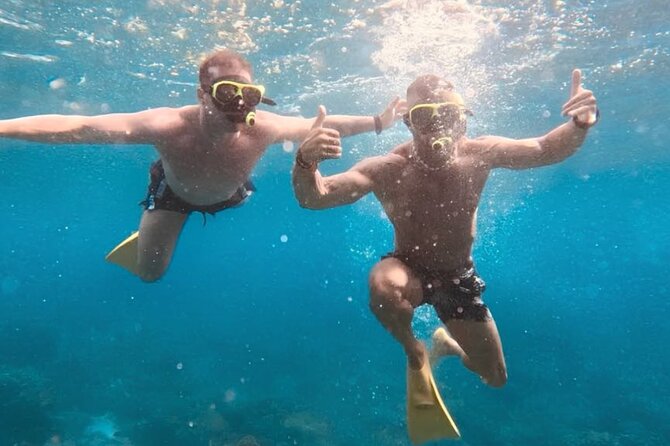 Full-day catamaran tour in Palermo: boat experience with lunch - Stop 2: Mondello Beach lunch on the water and real beach time