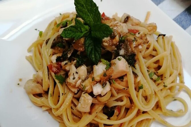 Full Day Sailing Tour Catania-Acitrezza - Lunch and wine on board: a real reason to enjoy the long day