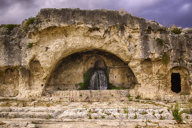 Group guided tour of the archaeological park of Neapolis - Stop 5: Syracuse Roman Amphitheater