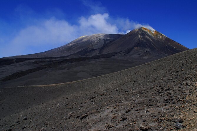 Half Day Guided Tour in Mount Etna (3000 meters) - The lava cave: helmet, torch, and darker geology