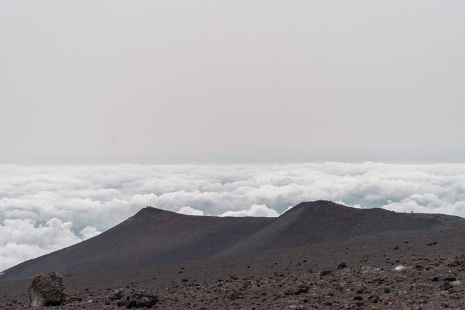 Half Day Guided Tour in Mount Etna (3000 meters) - At the summit: craters, steam, and the feeling of activity