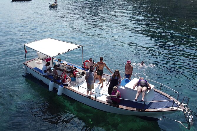 Half Day Private Guided Boat Tour in Taormina - Spisone Bay: boulders, pebbles, and an easy first swim