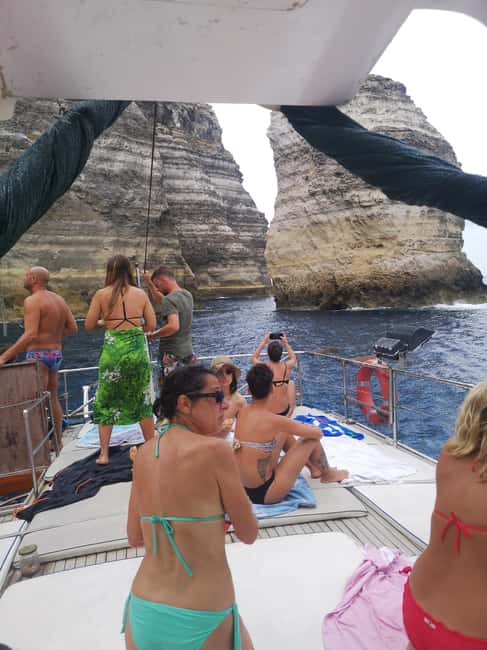 Lampedusa: Yacht excursion, swimming stops and typical lunch - Lunch onboard: fresh fish at the table (not just fuel)
