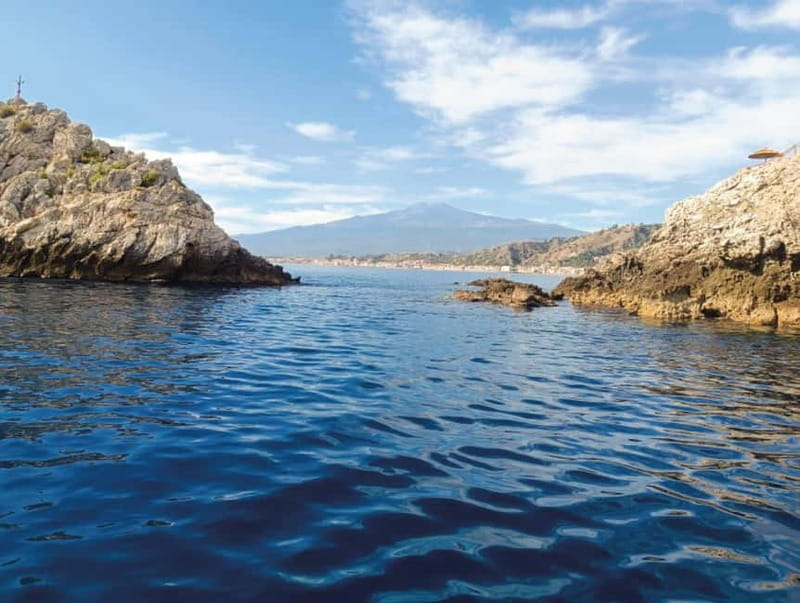 Naxos: Isola Bella, Blue Grotto, & Mazzarò Bay Boat Tour - Capo Taormina Faraglioni Photo Stop: The Classic Rock Formation, Up Close