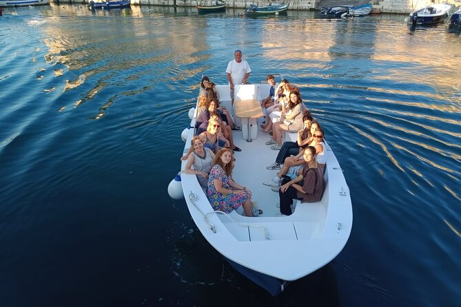 Ortigia Island and Sea Caves Boat Tour with Prosecco - Entering the sea caves: close views, quick surprises, and some motion