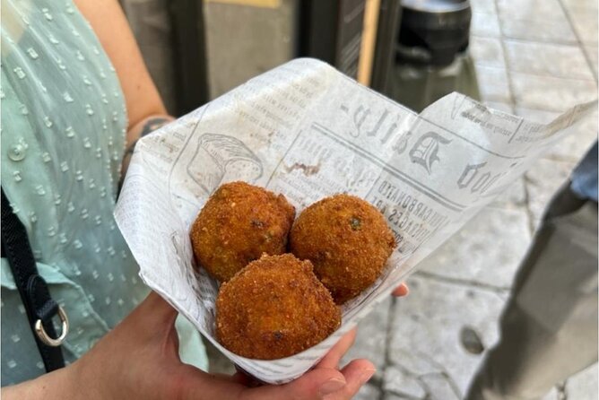Palermo Private Food Tour: 10+ Tastings of Arancini, Wine & More - Stop 5: Vucciria market, where butchers became traders
