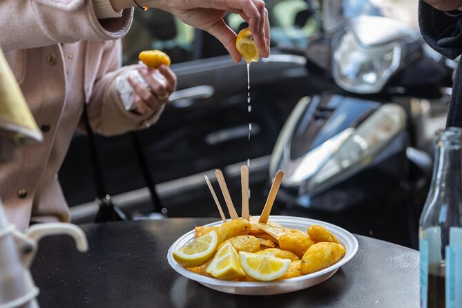 Palermo Street Food & Market Tour by Eating Europe - Ballarò Market and the Arch of Cutò: where the route tells a story