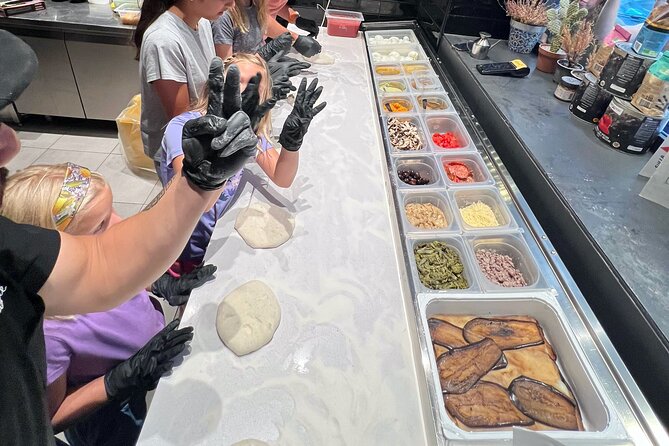 Pizza cooking class in real Pizzeria with Pizza chef & Tour guide - Timing and Meeting Point: Piazza Borsa at 5:00 PM