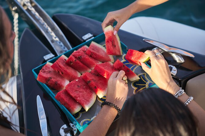 Private Boat Tour Discover the Coast of Palermo - Mondello Bay swim break: fruit, drinks, and a calmer coast mood
