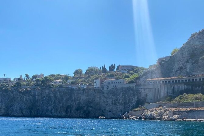 Private boat tour Giardini Naxos Taormina with platter and wine - Caves stop plus the platter-and-wine spread on board