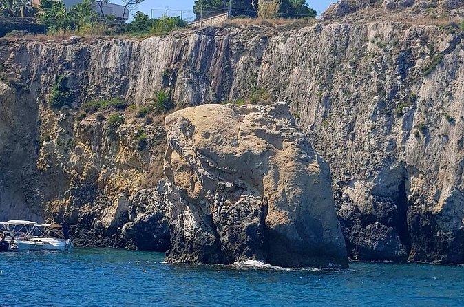 Private tour with fish products and full beverage. - Syracuse sea caves: the best part if you love color and shapes